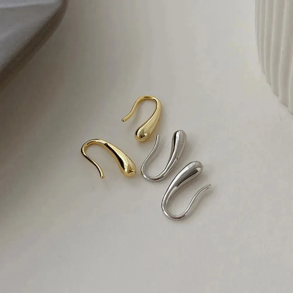 💧 Aqualoop Stud Earrings – Sleek • Serene • Sophisticated