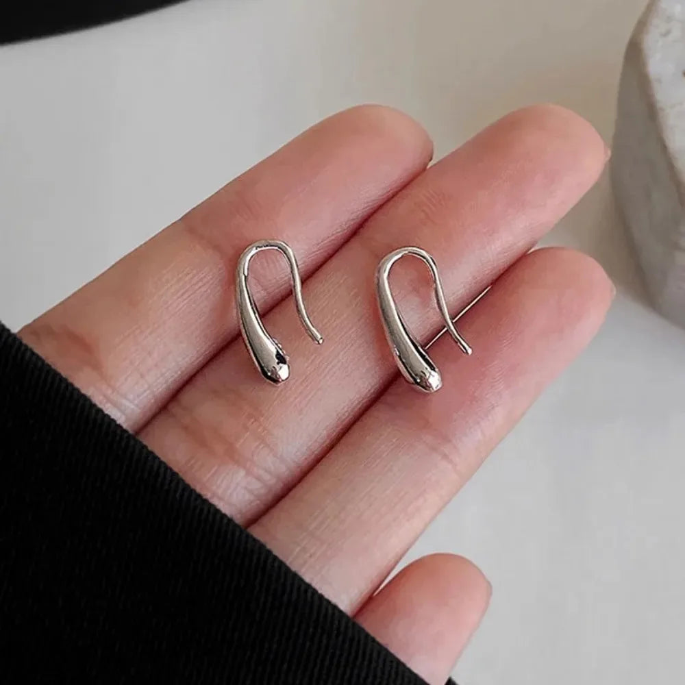 💧 Aqualoop Stud Earrings – Sleek • Serene • Sophisticated